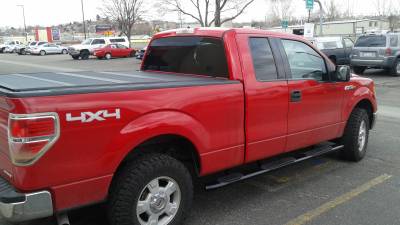 Westin Automotive Pro Traxx 5 inch wheel to wheel bars and a Bak Flip MX4 on a Ford F150