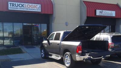 Undercover tonneau cover & Luverne running boards on a Dodge RAM