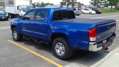 Westin HDX Drop Steps & a Bak Flip tonneau cover on a Toyota Tacoma